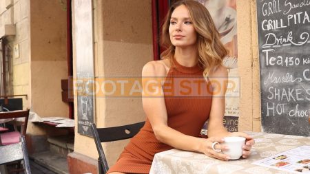 ethnic-woman-cafe-city-stock-video