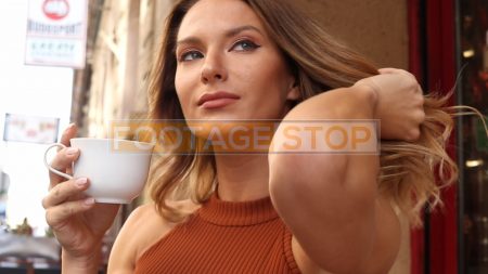 ethnic-woman-cafe-city-stock-video