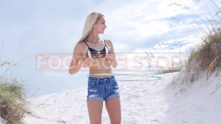 gen-z-beach-girl-hula-hoop-stock-video-5